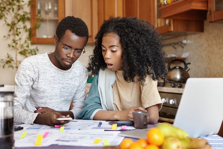 Couple reviewing bills