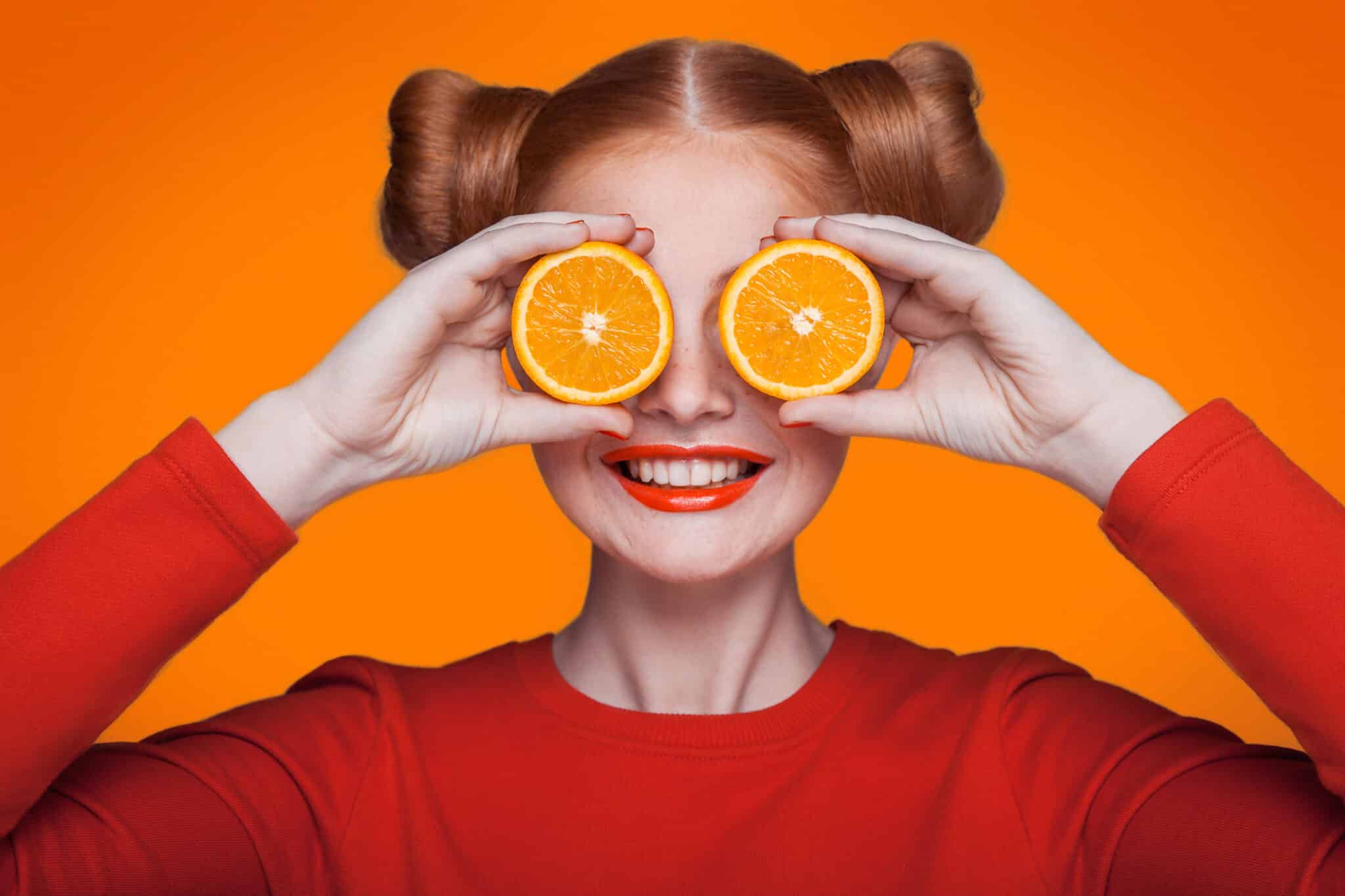 Woman with oranges