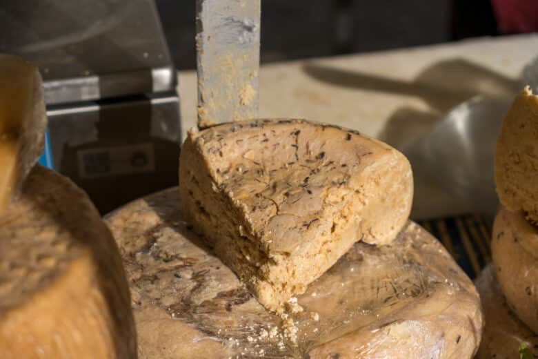 Traditional cheese with worms made in Sardenga. Photo Credit: DepositPhotos