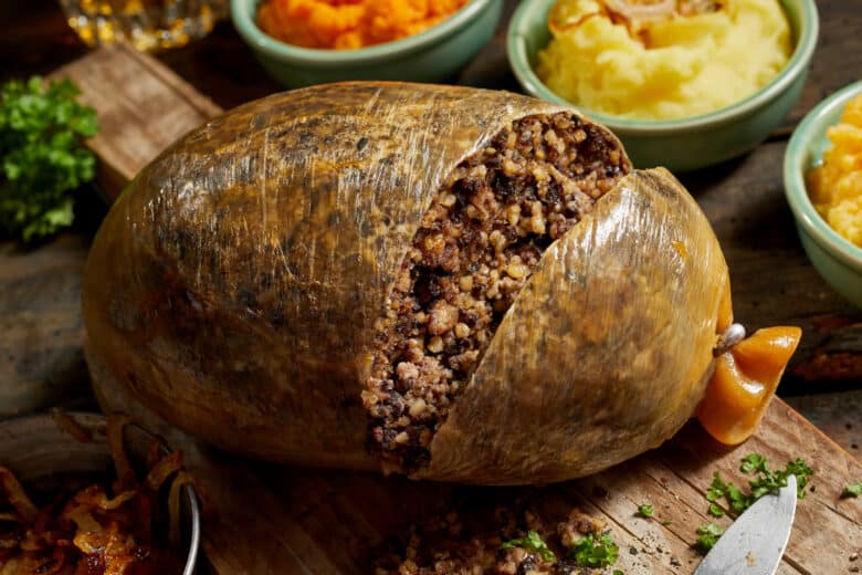 Close up on a sliced open cooked Scottish haggis. Photo Credit: DepositPhotos