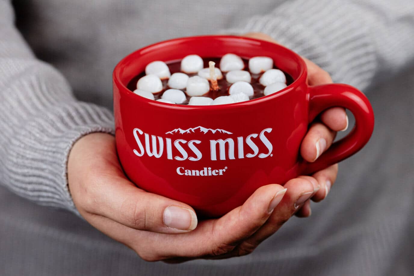 Swiss Miss hot cocoa candle in a mug