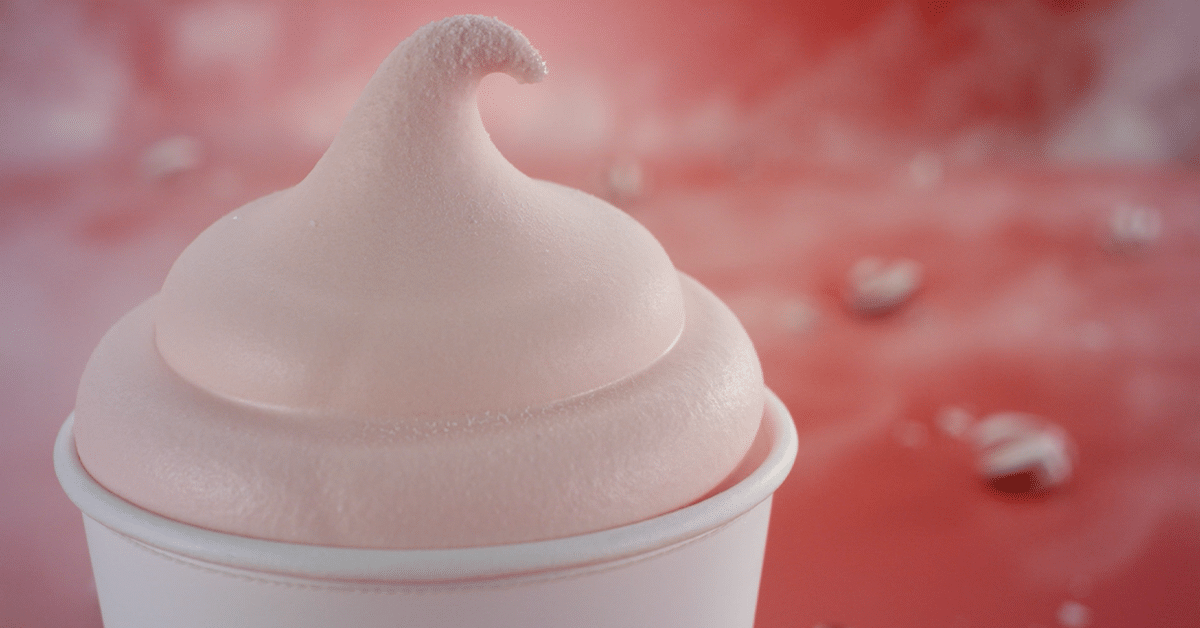 Closeup of Wendy's Peppermint Frosty on pink background
