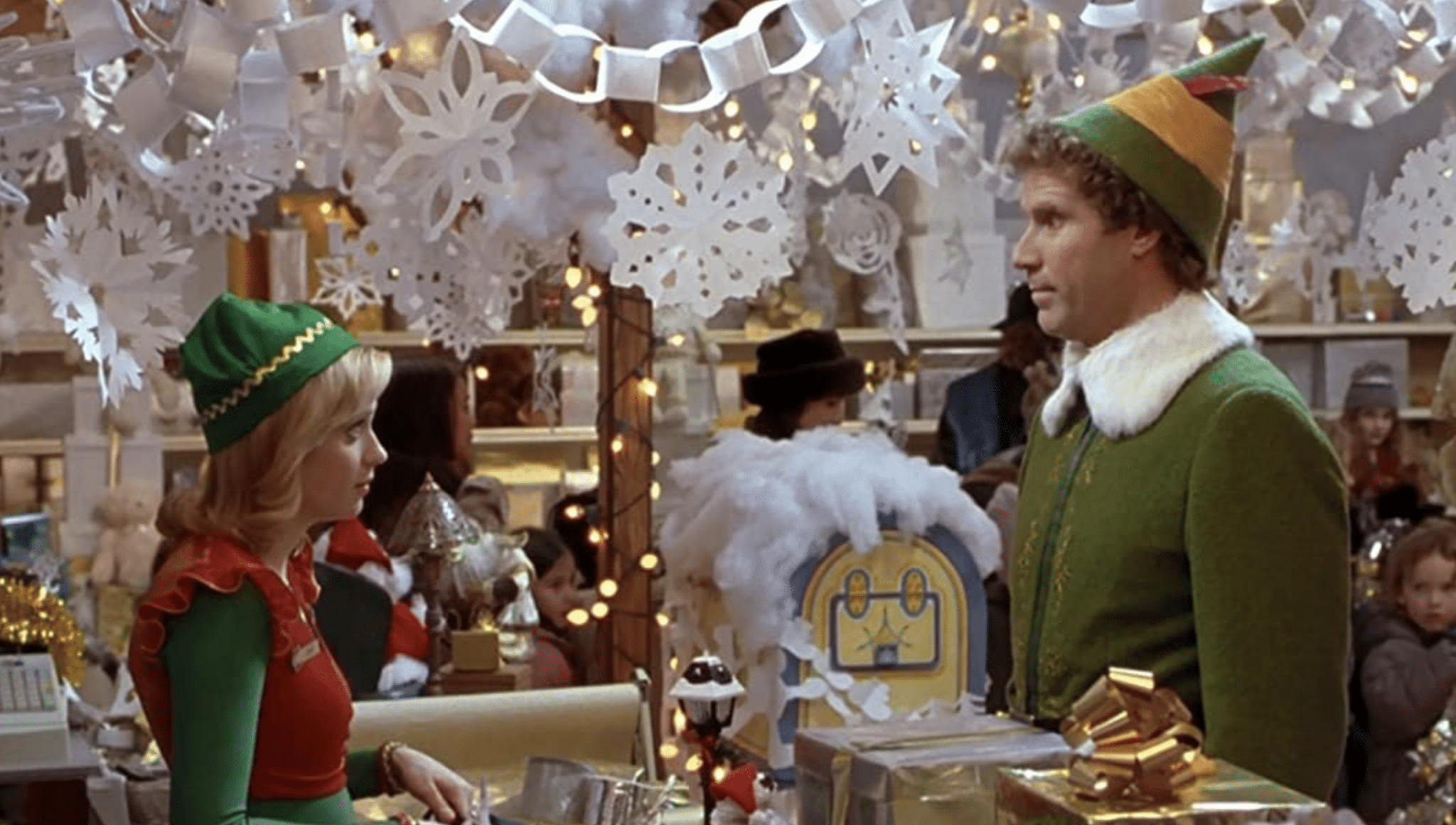 Will Ferrell and Zooey Deschanel in Elf (2003)