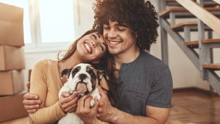 man and women are opposites testing if opposites attract as they hug and smile