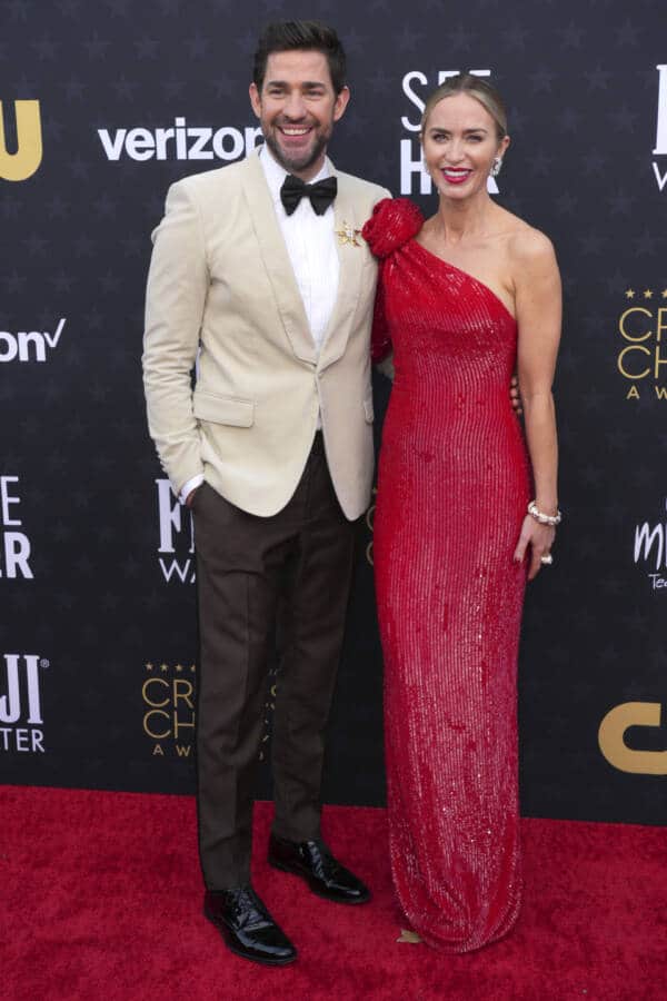 John Krasinski and Emily Blunt pose on red carpet
