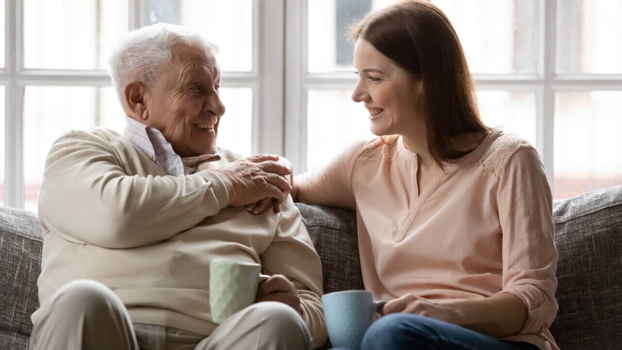 elderly man and daughter