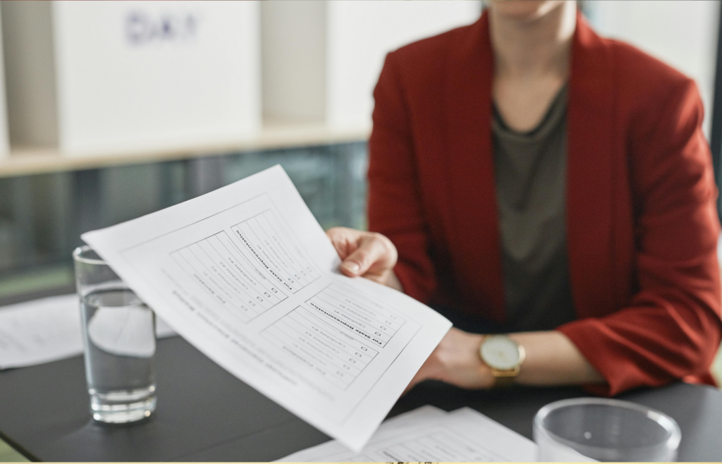 A Woman Holding a resume paper