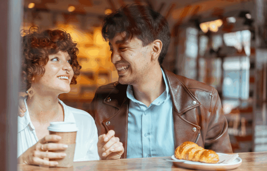 two people in a cafe
