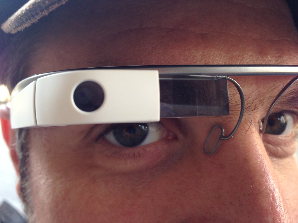 Man wearing Google glass wearable device