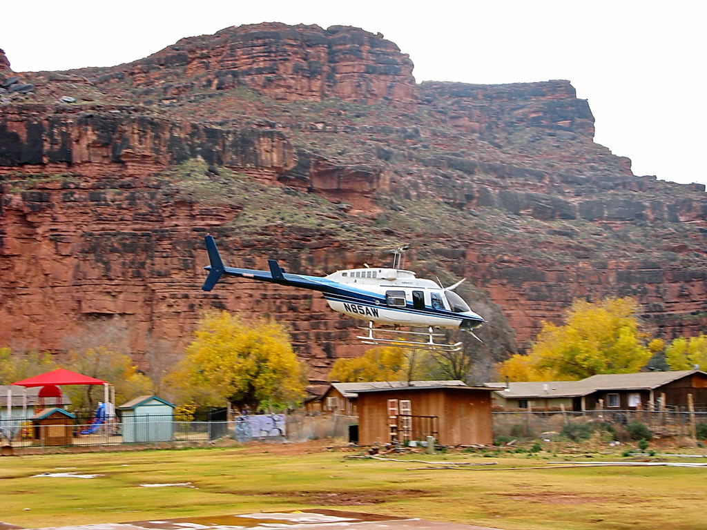 Airwest Helicopter N85AW taking off in the rain from Supai Village - Grand Canyon
