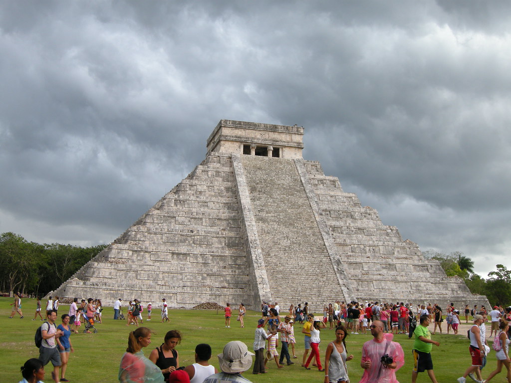 Chichen Itza pyramid sun with crowd