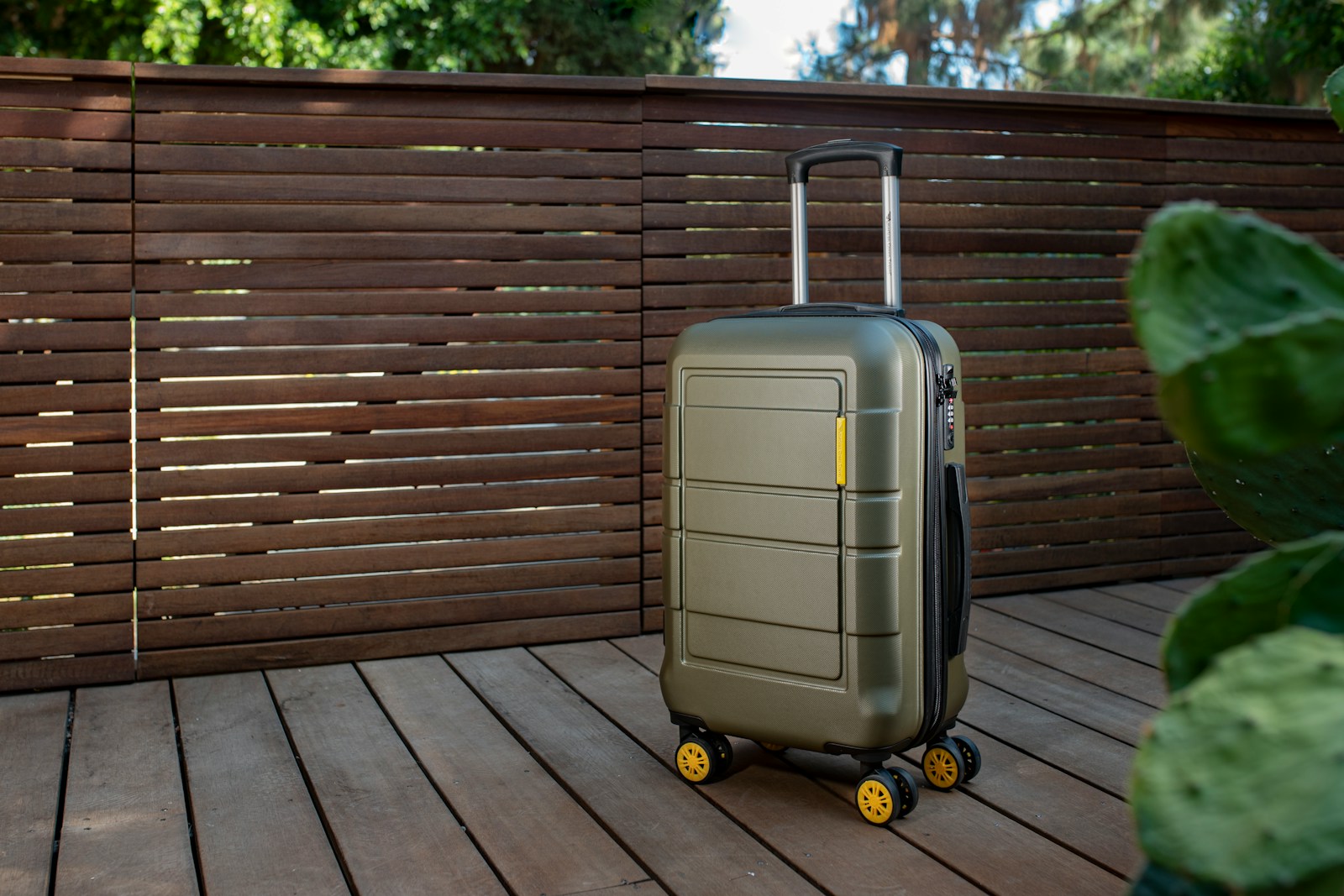 a piece of luggage sitting on top of a wooden deck
