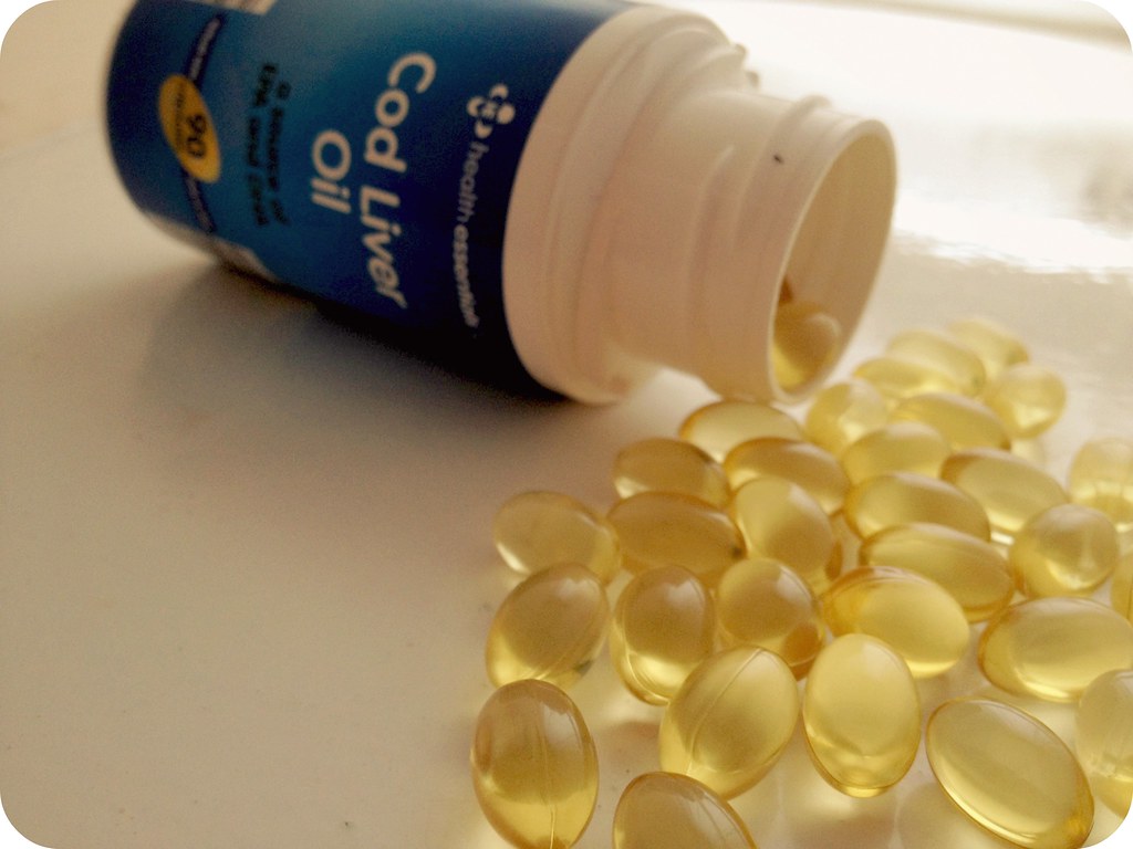 Cod liver oil supplement in bottle packaging