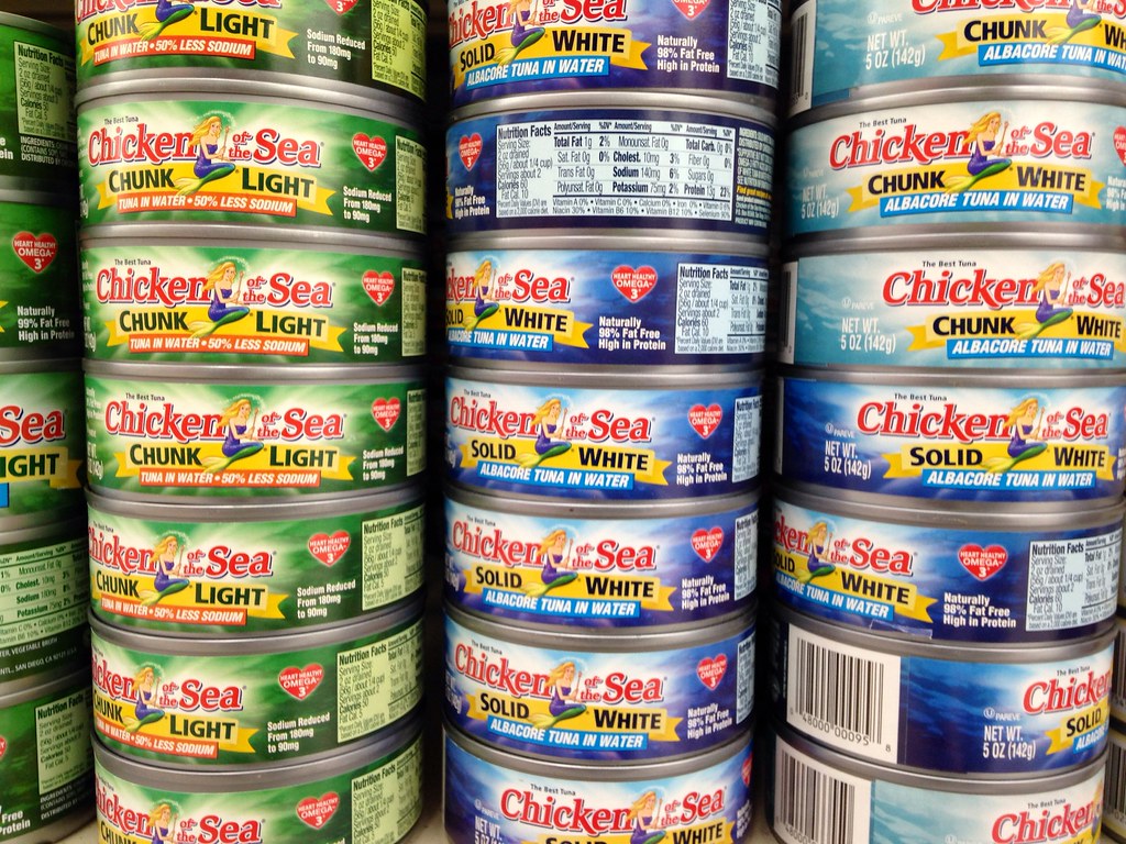 Stack of canned tuna at the grocery